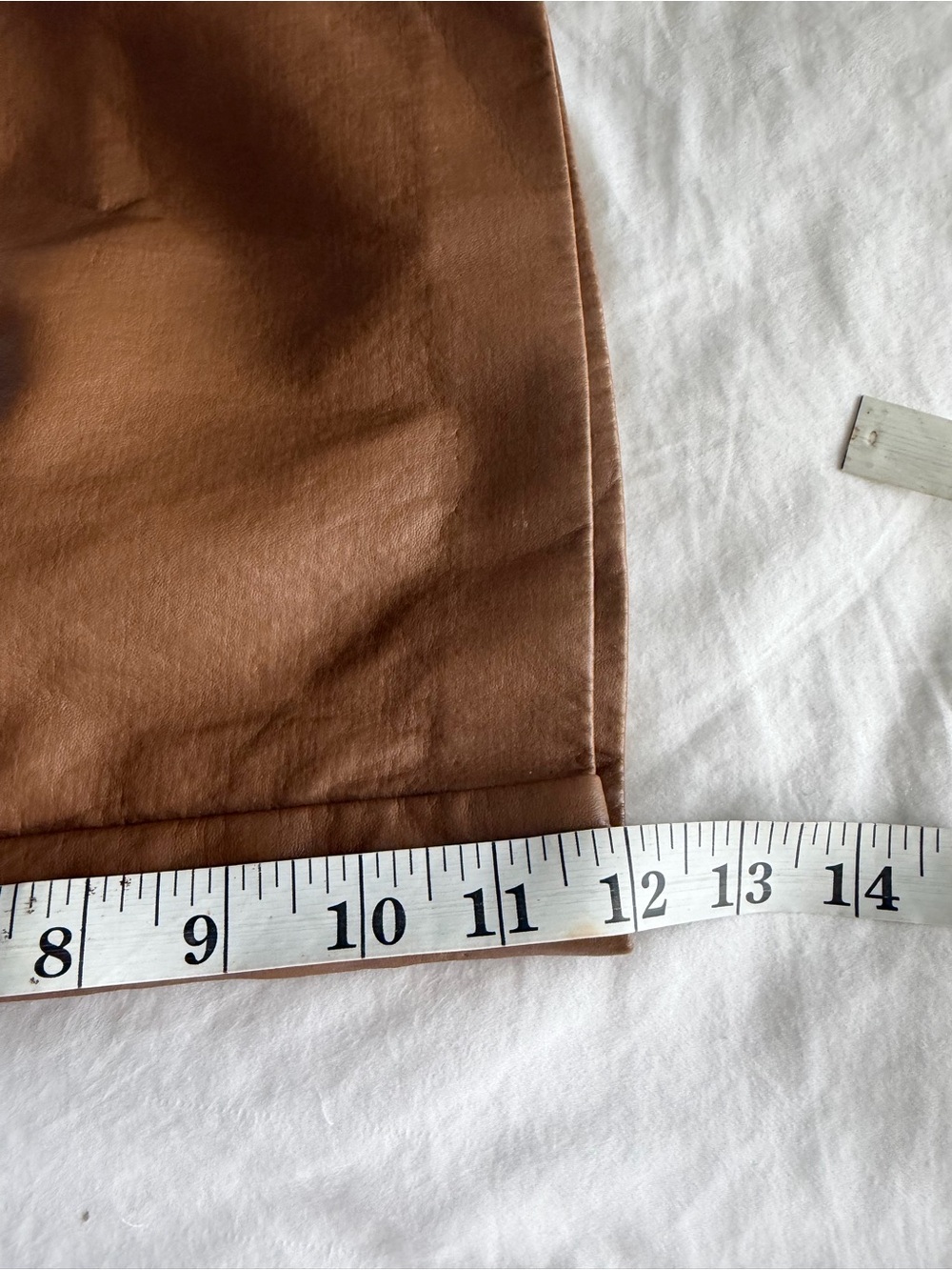 The Frankie Shop Pernille Pleated Faux Leather Shorts in Brown - Picture 16 of 16